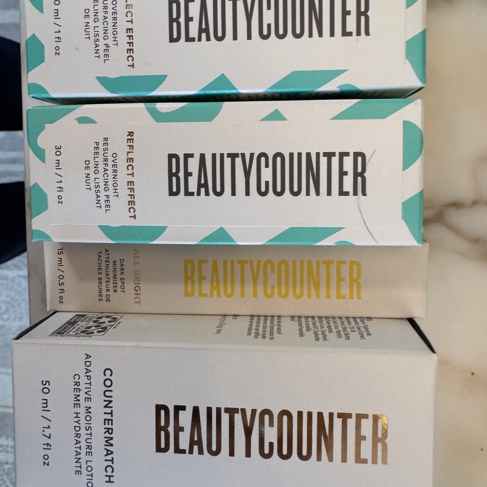 Beautycounter Skincare Set in White, Gold, and Teal